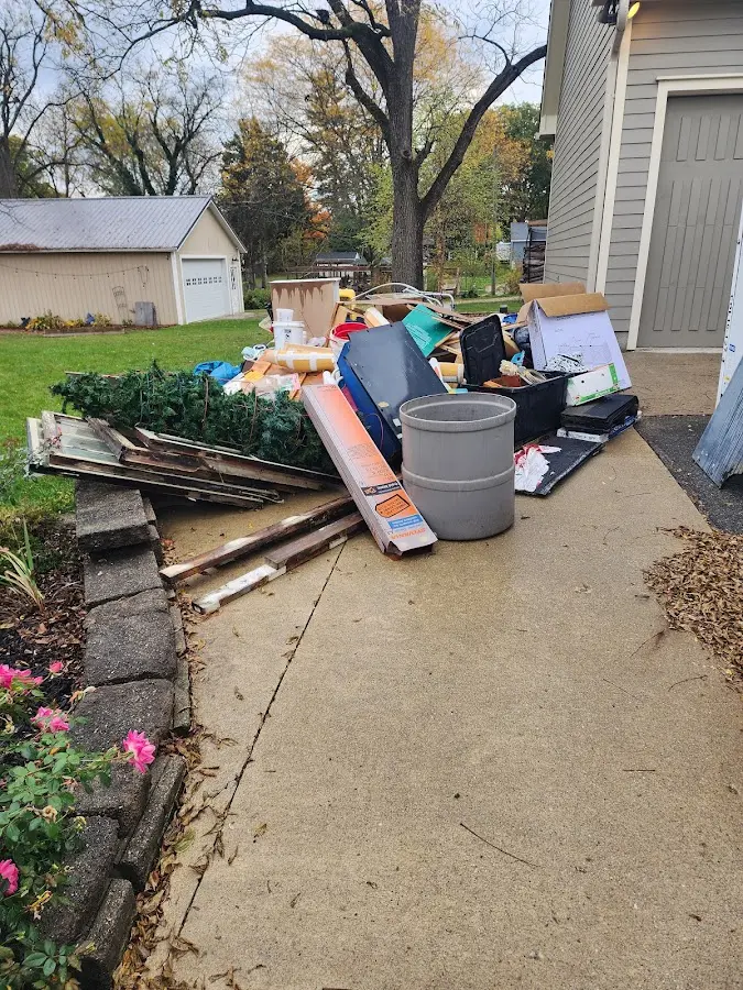 Dumpster being loaded with debris for Commercial Dumpster Rental in Dentsville